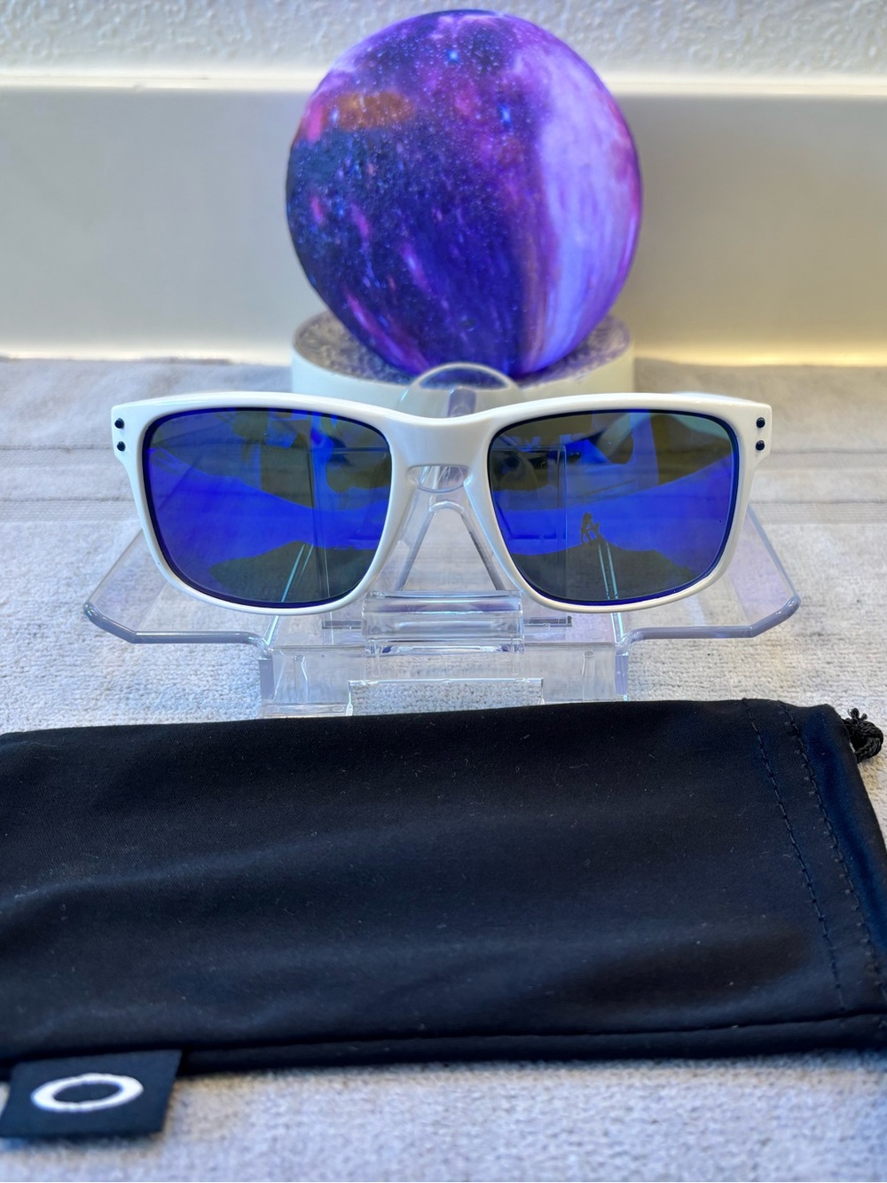 Oakley White Frame Sunglasses with Blue Mirror Lenses